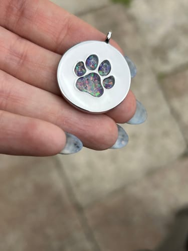 Customer photo review of Pawprint Disc Pendant with Cremation Ashes