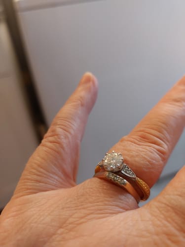 Customer photo review of Vintage Moissanite Side Stone Accents Milgrain Two Tone Engagement Ring