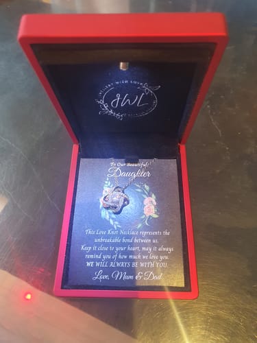 Customer photo review of To Our Beautiful Daughter - Love Knot Necklace