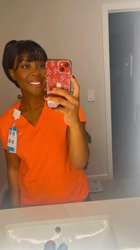 Customer photo review of Freetress Equal Synthetic Curtain Bang HD Lace Wig - BOMBSHELL