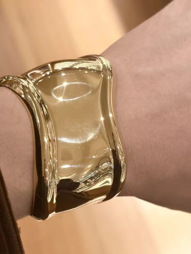 Customer photo review of AuricAdorn Small Bone Cuff in Gold Plated | Alloy Steel