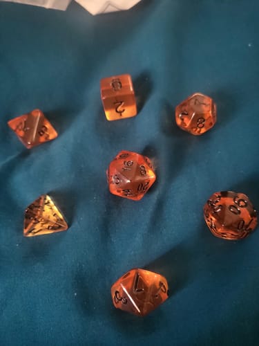 Customer photo review of Amber Ingots - 7 Piece DnD Dice Set | Acrylic RPG Gaming Dice