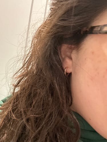 Customer photo review of Tiny Hoop Clip On Earrings in Rose Gold