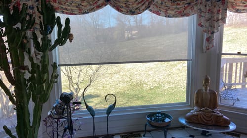 Customer photo review of SmartWings Motorized Light Filtering Roller Shades 70% Blackout Safari