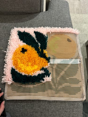 Customer photo review of A Bounty of Oranges Latch Hook Cushion Kit
