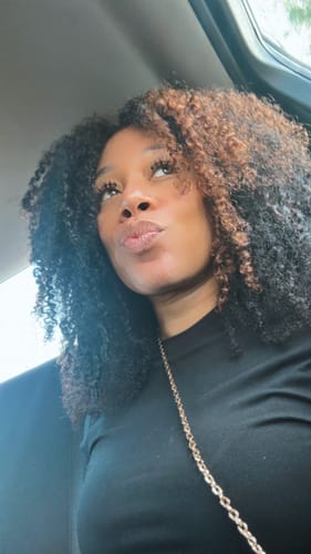 Customer photo review of CurlyMe Pre-bleached Wear Go Glueless Afro Kinky Curly Pre-cut HD Lace Wig Pre-plucked