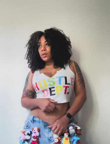 Customer photo review of CurlyMe Pre-bleached Wear Go Glueless Afro Kinky Curly Pre-cut HD Lace Wig Pre-plucked