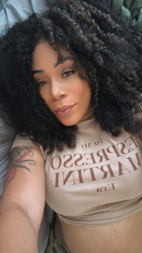 Customer photo review of CurlyMe Pre-bleached Wear Go Glueless Afro Kinky Curly Pre-cut HD Lace Wig Pre-plucked