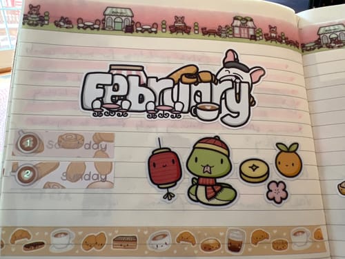 Customer photo review of Parisian Cafe Months - Planner Stickers