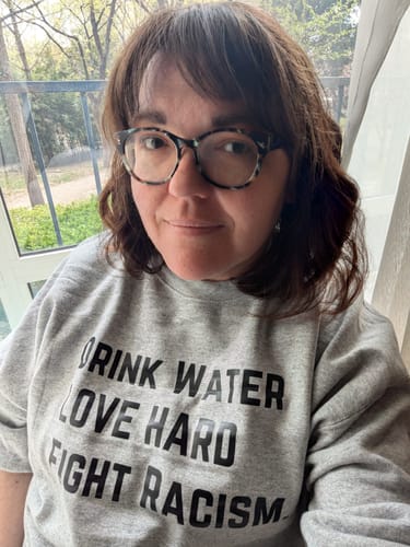 Customer photo review of Drink Water Fight Racism Sweatshirt