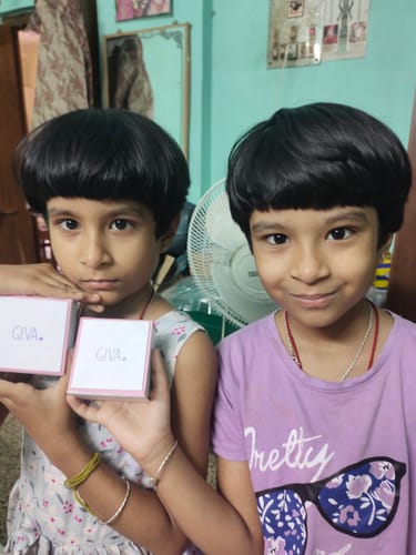 Customer photo review of Silver Golden Pie Unicorn Kids Earrings (4-12 yrs)