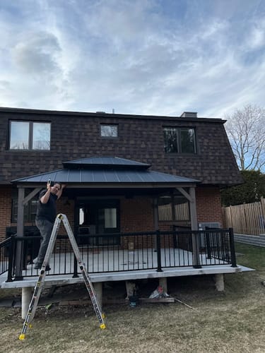 Customer photo review of SUNJOY Outdoor Patio 13' x 15' 2-Tier Wooden Frame Backyard Hardtop Gazebo with Ceiling Hook