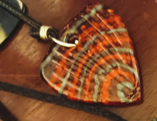 Customer photo review of Glass Guitar Pick with Infused Cremains