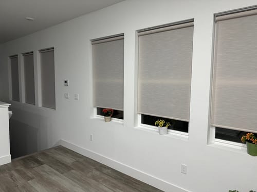 Customer photo review of SmartWings Motorized Light Filtering Roller Shades 70% Blackout Essential