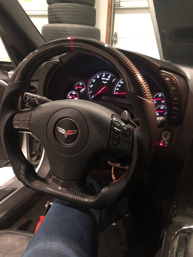 Customer photo review of Genuine Carbon Fiber Steering Wheel With Button Trim For C6 Corvette 2006-2011