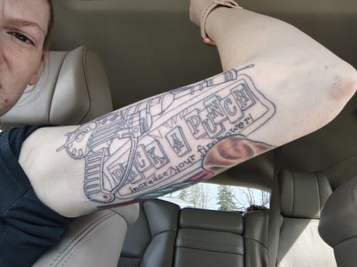 Customer photo review of Painless Tattoo Numbing Spray