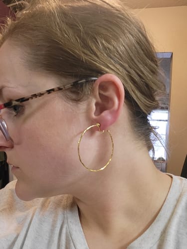 Customer photo review of Medium Thin Hammered Hoop Clip On Earrings in Gold