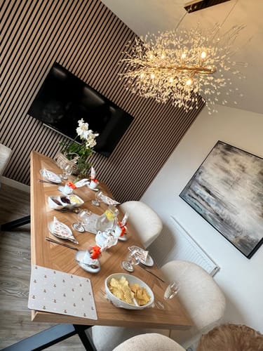 Customer photo review of Modern 12-Light Crystal Linear Chandelier