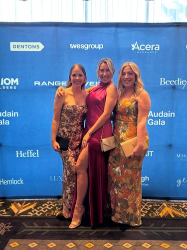 Customer photo review of Penelope Satin Gown in Magenta by Sau Lee - RENTAL