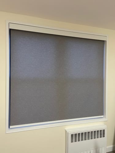 Customer photo review of SmartWings Motorized Light Filtering Roller Shades 70% Blackout Safari