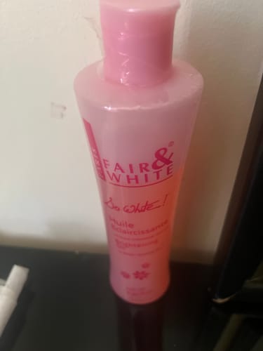 Customer photo review of Fair and White So White Brightening Body Oil with Sweet Almond Oil 250 ml / 8.4 fl oz