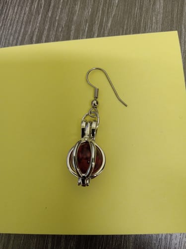 Customer photo review of Silver Cage Pendant with 10mm Glass Marble Infused with Cremains