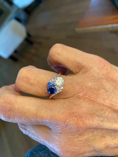 Customer photo review of Round Moissanite With Blue Sapphire Cluster Engagement Ring