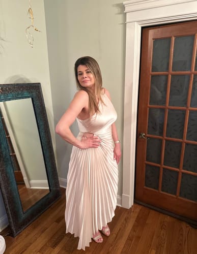 Customer photo review of River Pearl Beige Asymmetrical Pleated Maxi Dress