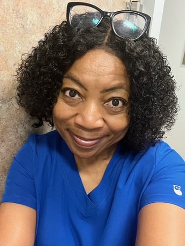 Customer photo review of CurlyMe Kinky Curly Glueless Bob Wig Pre Cut 6x4 HD Lace Wear Go Wig