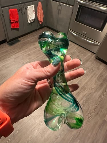 Customer photo review of Glass Dog Bone with Cremation Ashes