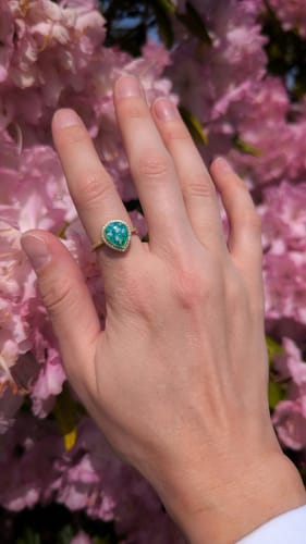 Customer photo review of Bedazzled Pear Opal Ring with Cremation Ashes