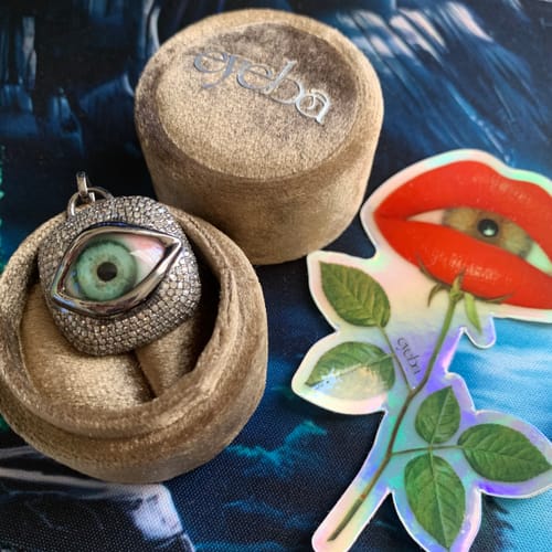 Customer photo review of Diamond Sea Green Silver Eye Pendant