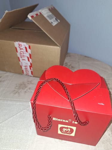 Customer photo review of 🌹Rosa Eterna + Collar + Pulsera Trébol Plata + Dedicatoria GRATIS -PARA MI HIJA