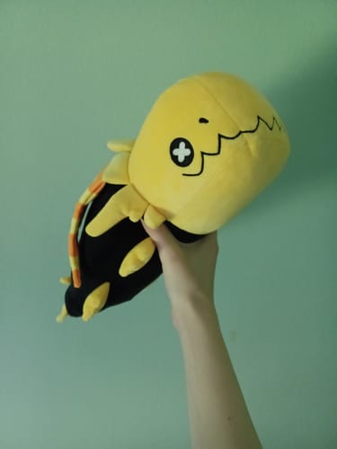 Customer photo review of Rain World - Glowing Yellow Lizard Plush