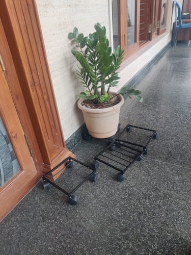 Customer photo review of United Crafts Rozy Wheel Pot Stands for Planters