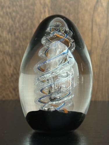 Customer photo review of Spiral Helix Glass Egg with Cremation Ashes