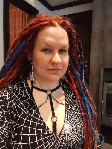 Customer photo review of Rhinestone Spider Dangle Earrings in Silver