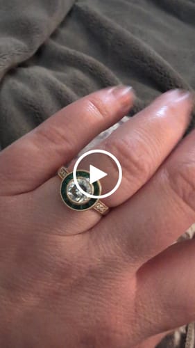 Andrea M. review of Doveggs round halo bezel moissanite engagement ring image 1 out of 1