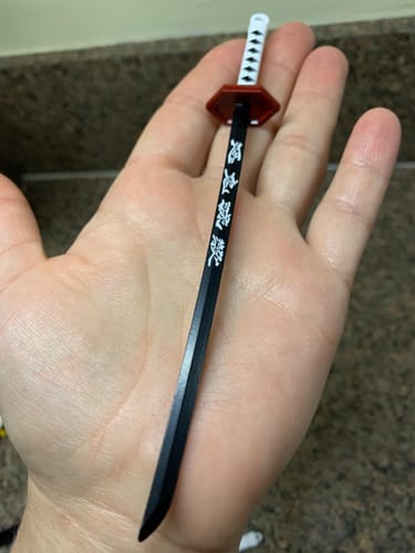 Customer photo review of Mini Katana Keychain