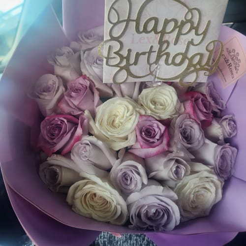 Customer photo review of Purple Tones Rose Bouquet