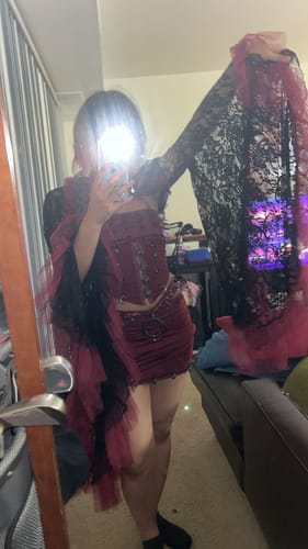 Customer photo review of 3 piece mini skirt set:Long flared sleeve PU leather rivet metal chain shrug 3 piece mini skirt set