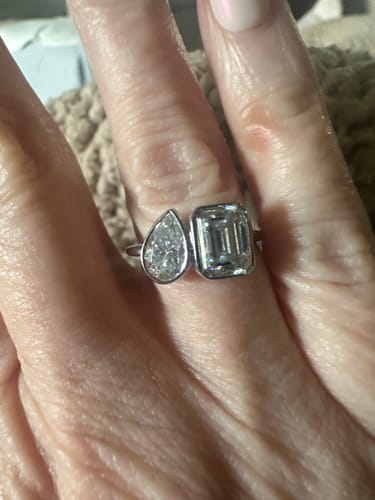 Customer photo review of Tessa Toi Et Moi Engagement Ring in 14k White Gold With Pear and Emerald Two Stone Moissanite Diamond (2.5 Ct. Tw.)