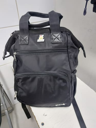 Reseña con foto de un cliente sobre Mochila Maternal