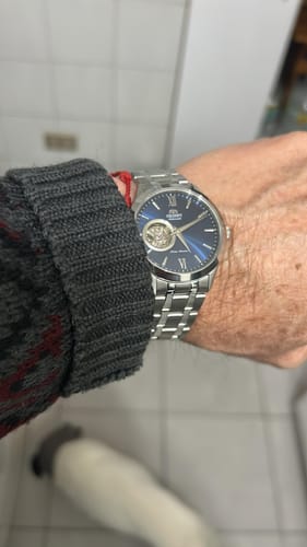 Reseña con foto de un cliente sobre Reloj Orient TAG03001D Automático Open Heart Azul 38,5 mm