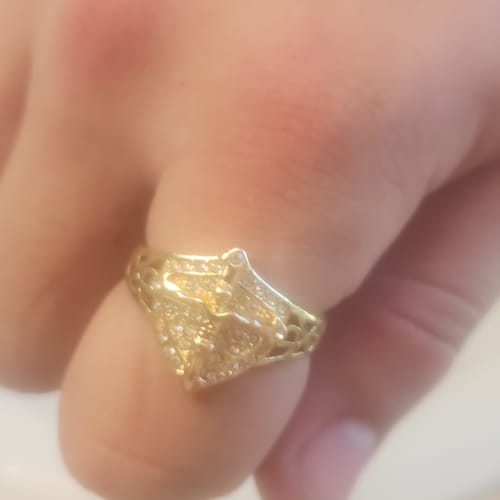 Customer photo review of FREE Today: Divine Shield Crucifix Luxurious Ring: A Bold Testament of Faith and Devotion