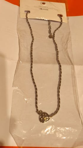 Reseña con foto de un cliente sobre Collar Moneda Machacada