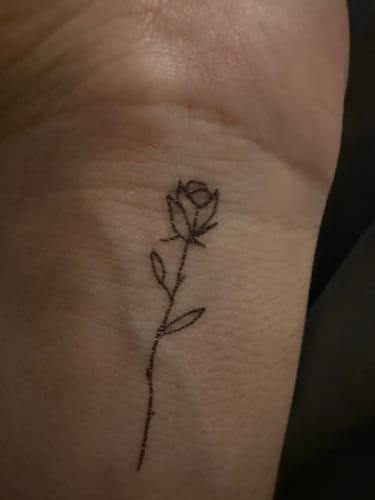 Customer photo review of Rose Finger Tattoo