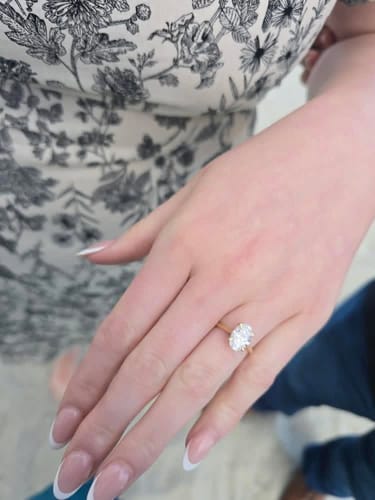 Customer photo review of Aria 2 Carat Oval Solitaire Moissanite Diamond Ring in 10k Yellow Gold