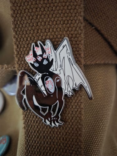 Customer photo review of Gore Angel Enamel Pins