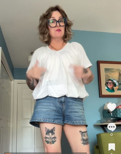 Customer photo review of Zoe Mid-Rise Denim Mini Shorts